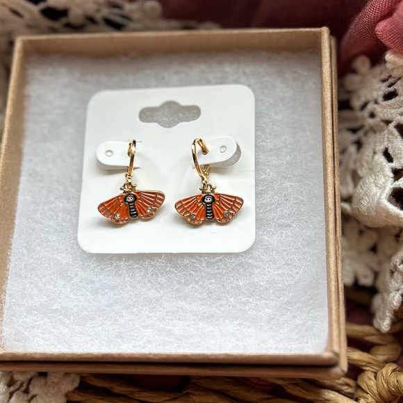 Moth Earrings - Gold plated huggie hoops with orange moth charms - Picture 1 of 4